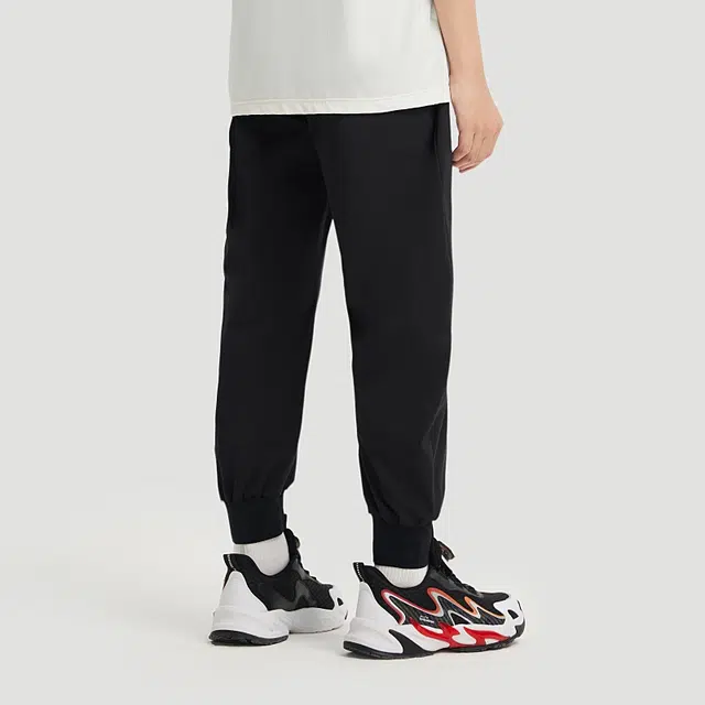 青少年 安踏儿童 纯色中腰舒适透气束脚针织运动裤 基础黑