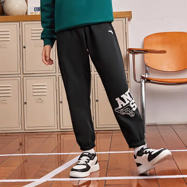 安踏儿童 字母中腰舒适透气百搭加绒保暖束脚针织运动裤 梦幻黑青少年