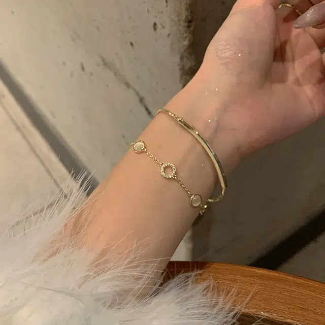 希遇 双层叠戴猫眼石手镯闺蜜款轻奢简约百搭小众精致高级感可调节抽拉手饰 铜 手链 女款