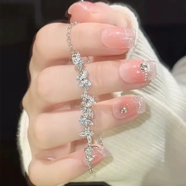 希遇 紫藤花微笑脸手饰轻奢小众设计感简约百搭闺蜜赠礼 合金 手链 女款