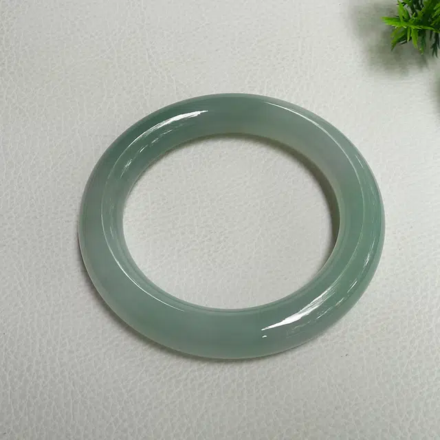 54.7mm