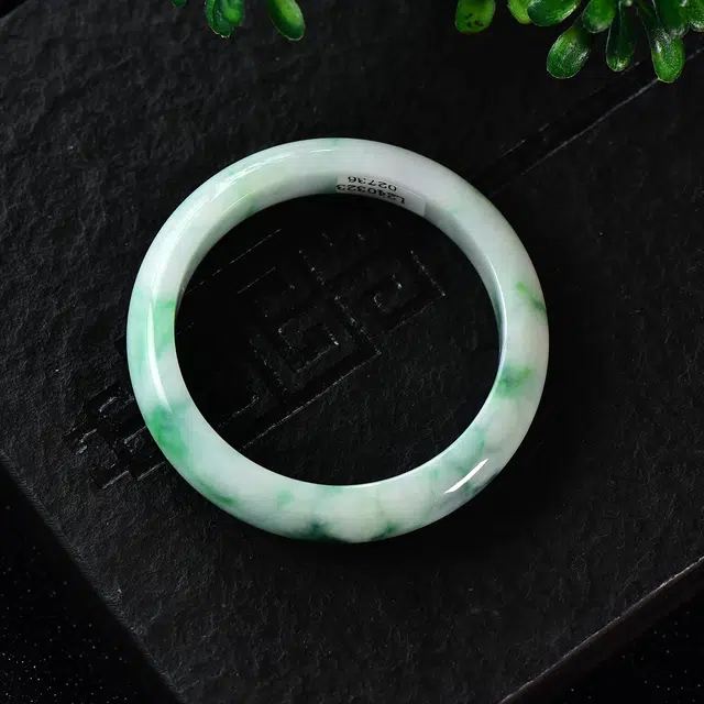 54.7mm