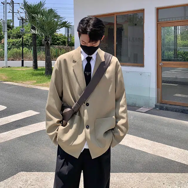 稻草人 美式高街基础款纯色垫肩外套高级感日常百搭休闲宽松潮流落肩长袖单排扣轻奢西装 男女同款