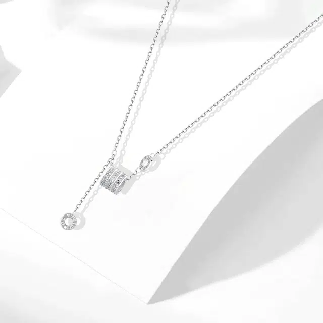 牧言 冷淡风气质简约小众设计高级感 光面立体璀璨圆环罗马数字不对称链条流苏锁骨链 钛钢 闪耀小蛮腰项链 女款