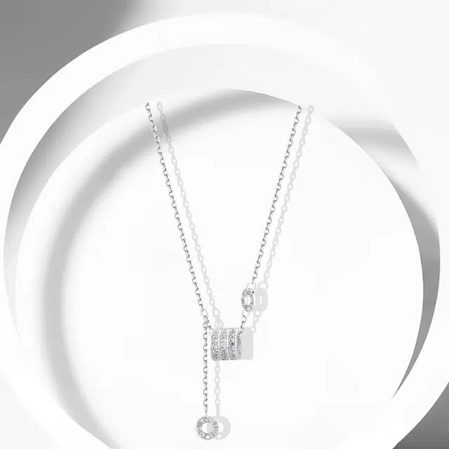 牧言 冷淡风气质简约小众设计高级感 光面立体璀璨圆环罗马数字不对称链条流苏锁骨链 钛钢 闪耀小蛮腰项链 女款