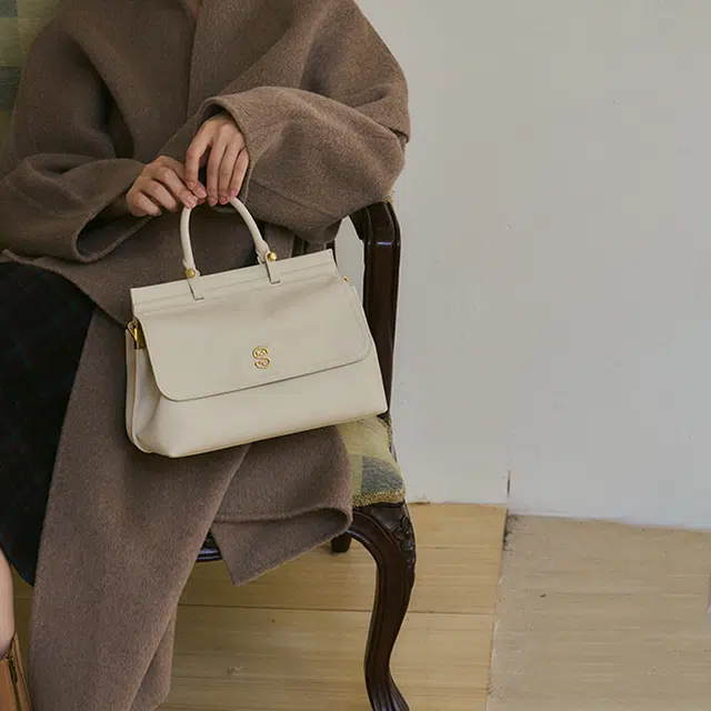 西木汀 追光 高级感简约凯莉包通勤妈妈包 牛皮 单肩手提包 女款 米白色/深邃黑/焦糖棕
