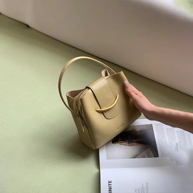 西木汀 妮娜 小众设计高级感上班族洋气菜篮子包通勤水桶包 牛皮 手提包 女款 日光黄/开心果白/深邃黑