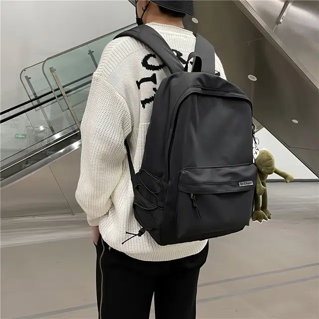 醇龙 耐脏简约书包大学生校园初中背包休闲旅行包 尼龙 双肩包 常规 男女同款情侣款 黑色/白色