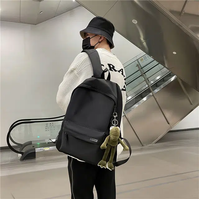 醇龙 耐脏简约书包大学生校园初中背包休闲旅行包 尼龙 双肩包 常规 男女同款情侣款 黑色/白色