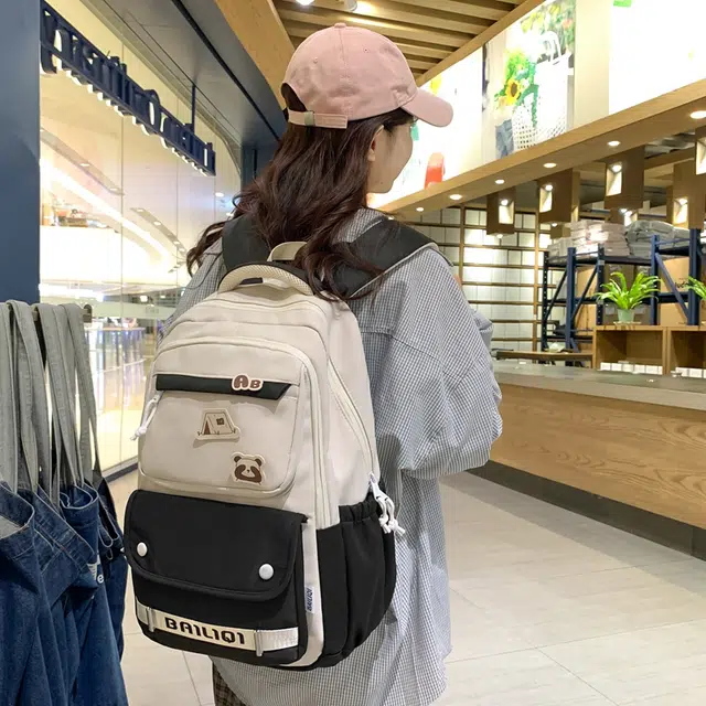 醇龙 冬季书包高中生中学生大学双肩包韩版简约减负大容量背包女 尼龙