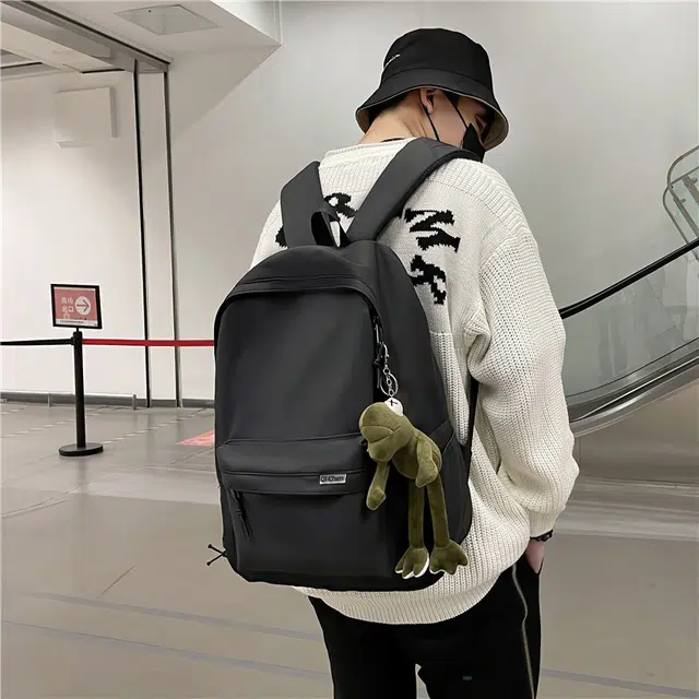 醇龙 耐脏简约书包大学生校园初中背包休闲旅行包 尼龙 双肩包 常规 男女同款情侣款 黑色/白色