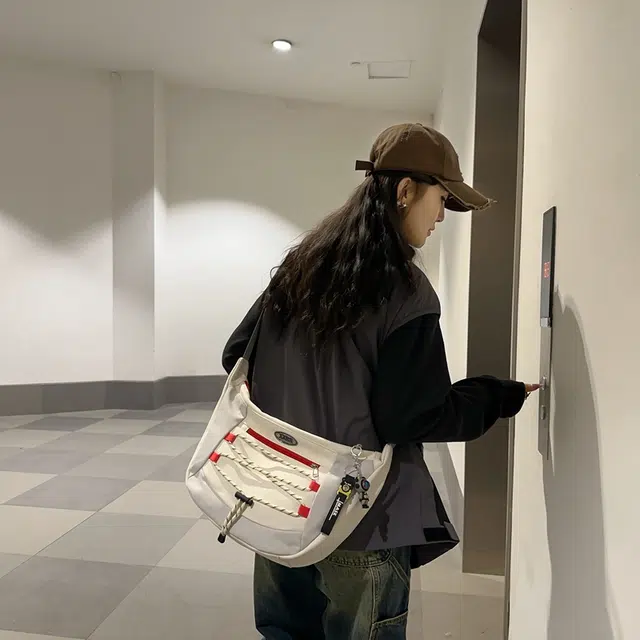 醇龙棉轻便个性休闲斜挎包男女时尚潮流通勤邮差百搭单肩斜挎包女潮多色