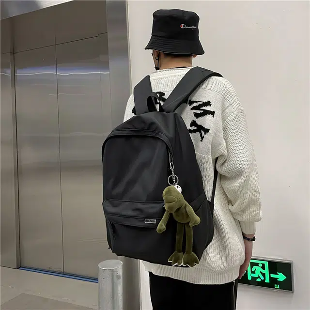 醇龙 耐脏简约书包大学生校园初中背包休闲旅行包 尼龙 双肩包 常规 男女同款情侣款 黑色/白色