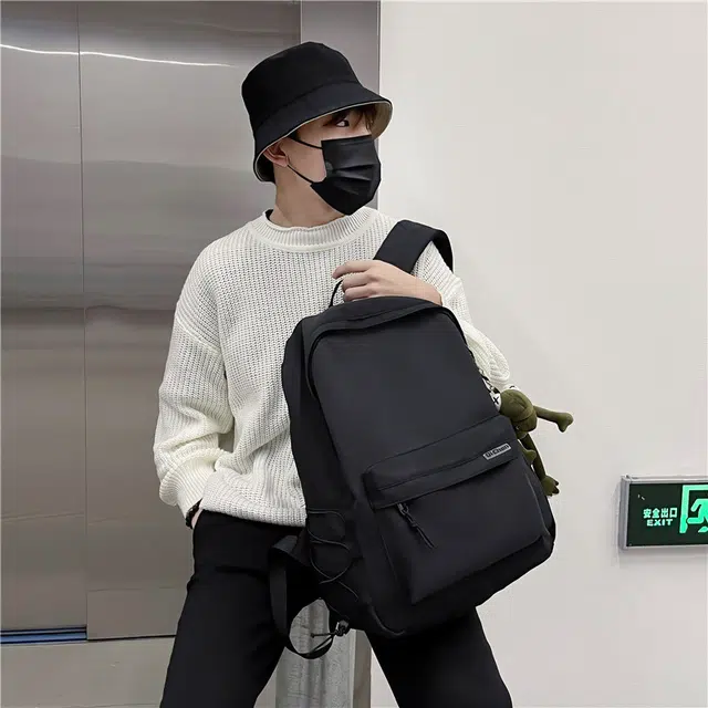 醇龙 耐脏简约书包大学生校园初中背包休闲旅行包 尼龙 双肩包 常规 男女同款情侣款 黑色/白色