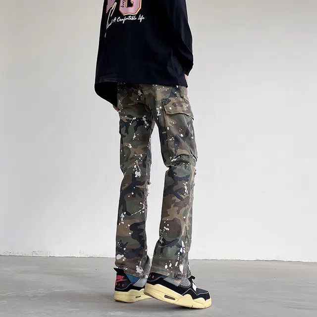 人本 美式迷彩高街伐木风创意泼墨涂鸦破洞磨破翻盖拼接口袋工装长裤百搭牛仔裤 男女同款