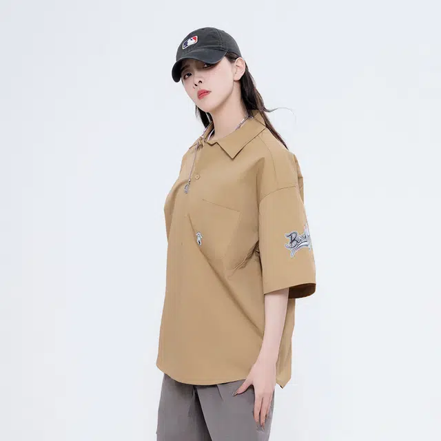 大卫贝肯 卡通倒霉熊字母印花贴袋落肩宽松休闲短袖衬衫 男女同款