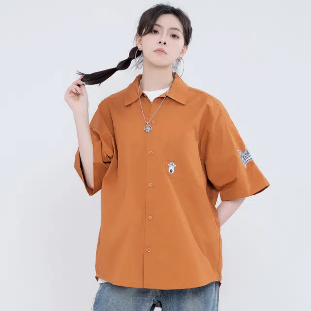 大卫贝肯 卡通倒霉熊字母印花贴袋落肩宽松休闲短袖衬衫 男女同款