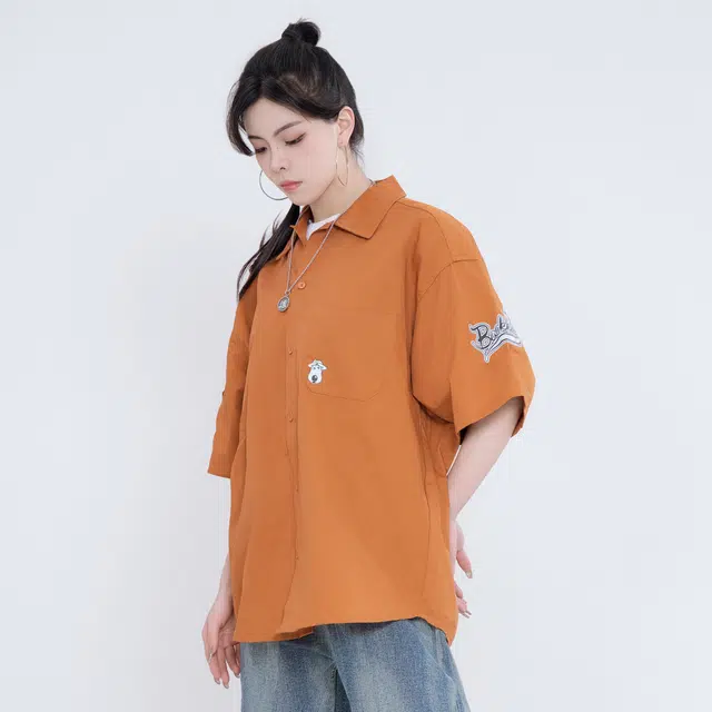 大卫贝肯 卡通倒霉熊字母印花贴袋落肩宽松休闲短袖衬衫 男女同款