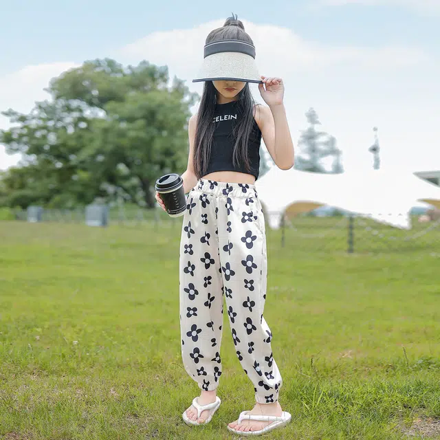 唐狮童装 花朵印花满印松紧腰宽松束脚休闲裤 儿童款 米白色