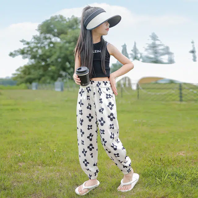 唐狮童装 花朵印花满印松紧腰宽松束脚休闲裤 儿童款 米白色