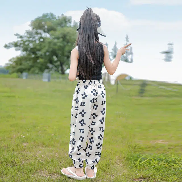唐狮童装 花朵印花满印松紧腰宽松束脚休闲裤 儿童款 米白色