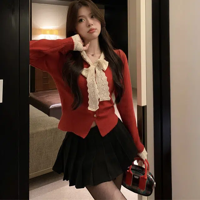 玉儿恋 韩版蕾丝蝴蝶结设计感收腰短款长袖针织衫 女款