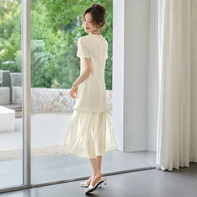 潞优野 圆领宽松休闲气质优雅长裙显瘦层次感拼接短袖连衣裙 女款
