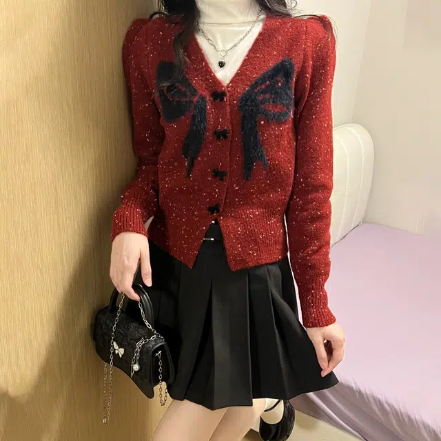 冰淇淋与鲸 设计感波点收腰长袖针织衫 女款