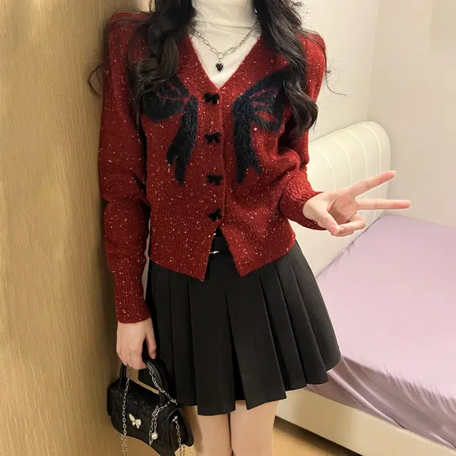 冰淇淋与鲸 设计感波点收腰长袖针织衫 女款