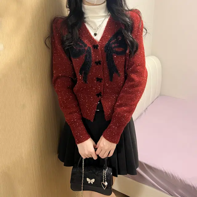 冰淇淋与鲸 设计感波点收腰长袖针织衫 女款