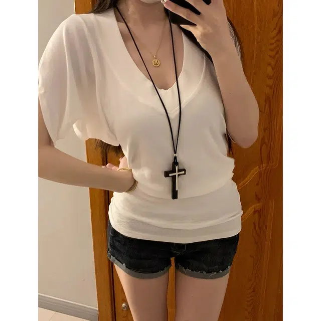 MUCCHIC V T