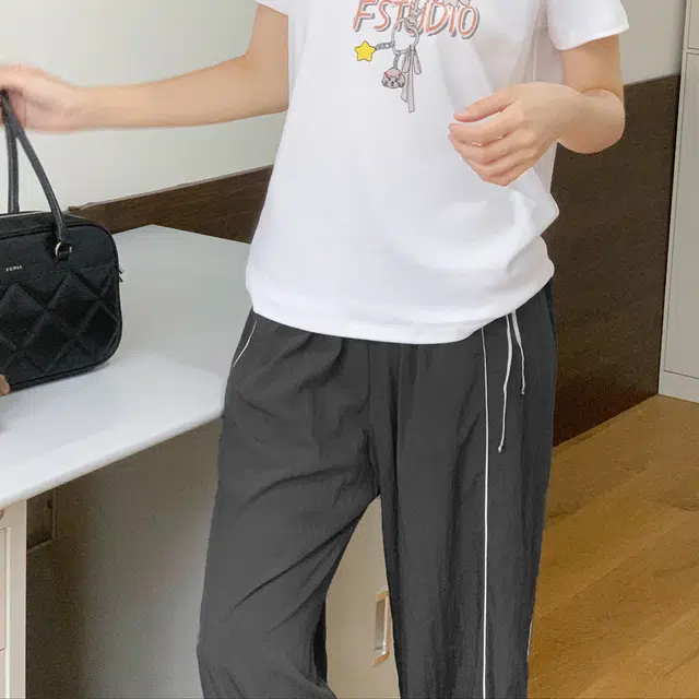 法儿家 元气假日韩系慵懒感穿搭工装风松紧休闲裤 女款