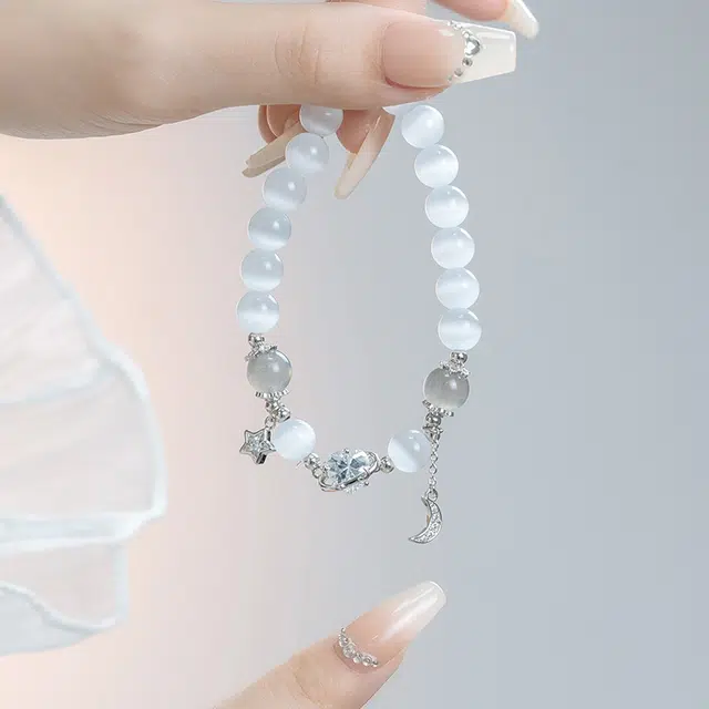 银千惠 新中式浪漫星月国潮闪耀星星宝石镶嵌大颗心形闪锆璀璨吸睛月亮流苏串珠链 国潮准运珠流苏平安纳福手腕链 小众白月光 手串 女款