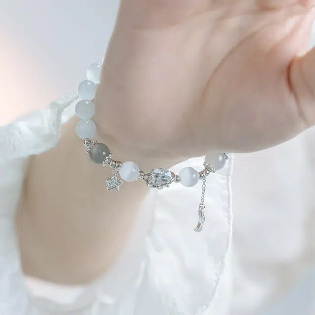 银千惠 新中式浪漫星月国潮闪耀星星宝石镶嵌大颗心形闪锆璀璨吸睛月亮流苏串珠链 国潮准运珠流苏平安纳福手腕链 小众白月光 手串 女款