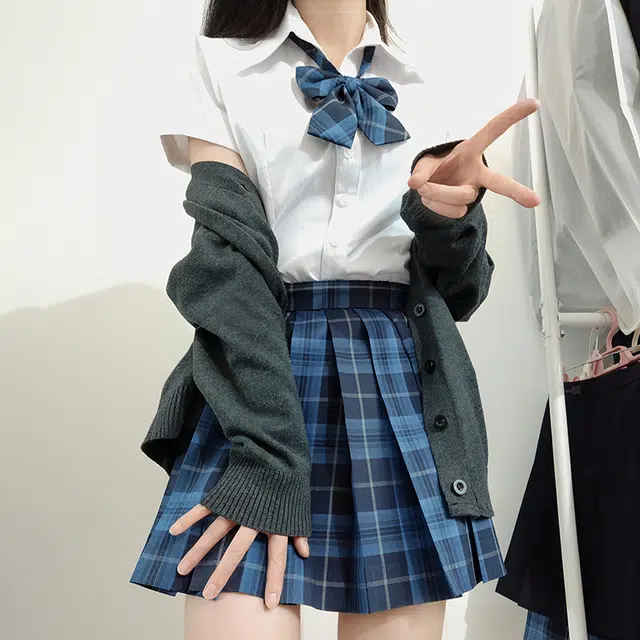 东鲸岁时记 日系复古制服格纹短款百搭学生百褶鲸落半身裙