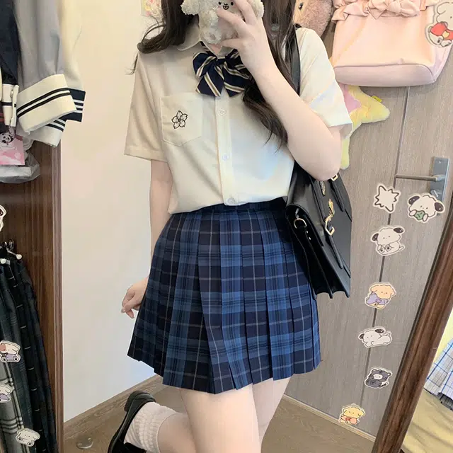 东鲸岁时记 日系复古制服格纹短款百搭学生百褶鲸落半身裙