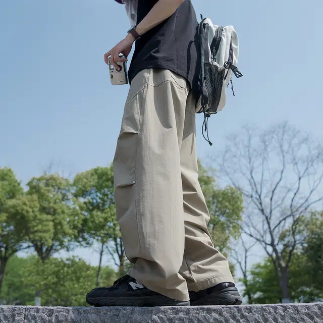 港仔文艺男 拼接解构侧面条纹亮扣设计垂感速干户外运动薄款伞兵裤直筒百搭阔腿休闲裤 男女同款