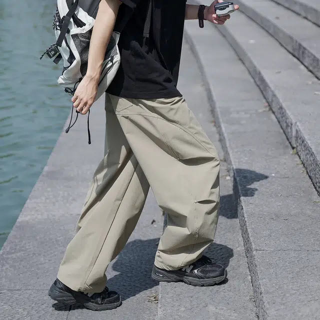 港仔文艺男 拼接解构侧面条纹亮扣设计垂感速干户外运动薄款伞兵裤直筒百搭阔腿休闲裤 男女同款