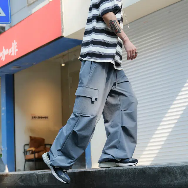 港仔文艺男 褶皱拼接解构拉链口袋可调节裤腿设计感户外运动工装裤日系百搭宽松休闲裤 男女同款