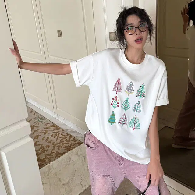 Katie Ermilio T