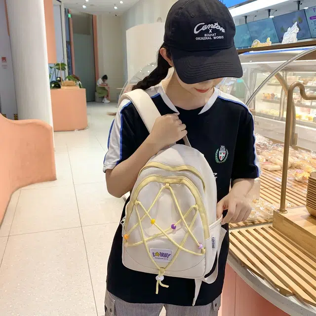 巴朗熊  日系小清新抽绳双肩包潮休闲拼接多色尼龙女款