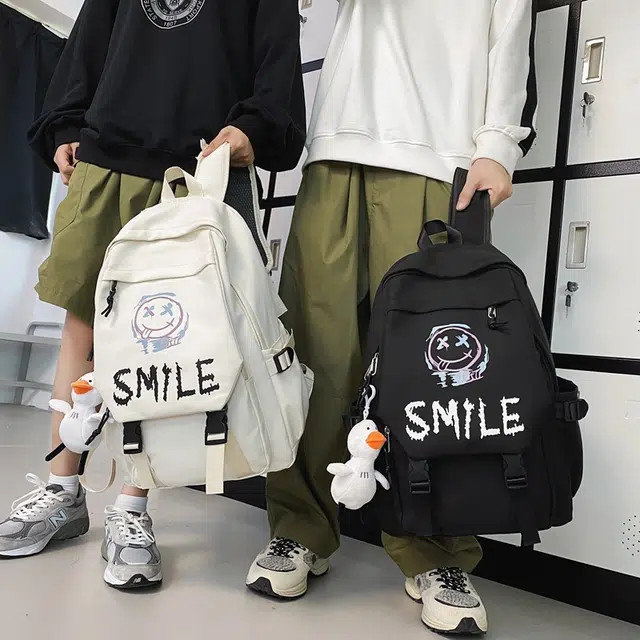 巴朗熊 韩版可爱笑脸 尼龙 双肩包 常规 男女同款情侣款 多色