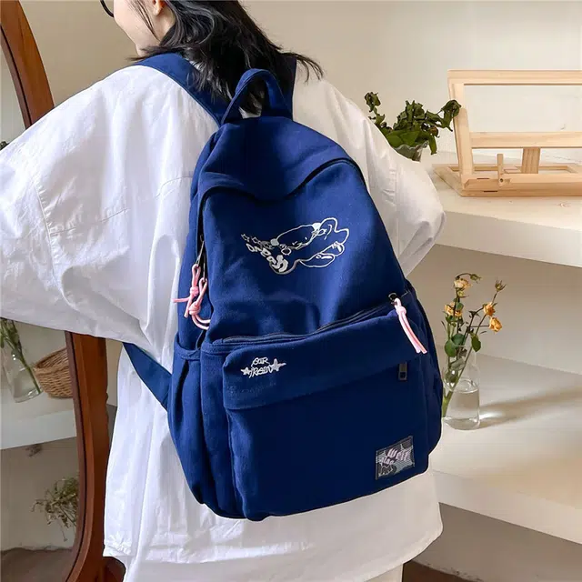 巴朗熊  水洗帆布大容量双肩包感垂垂包女可爱刺绣设计
