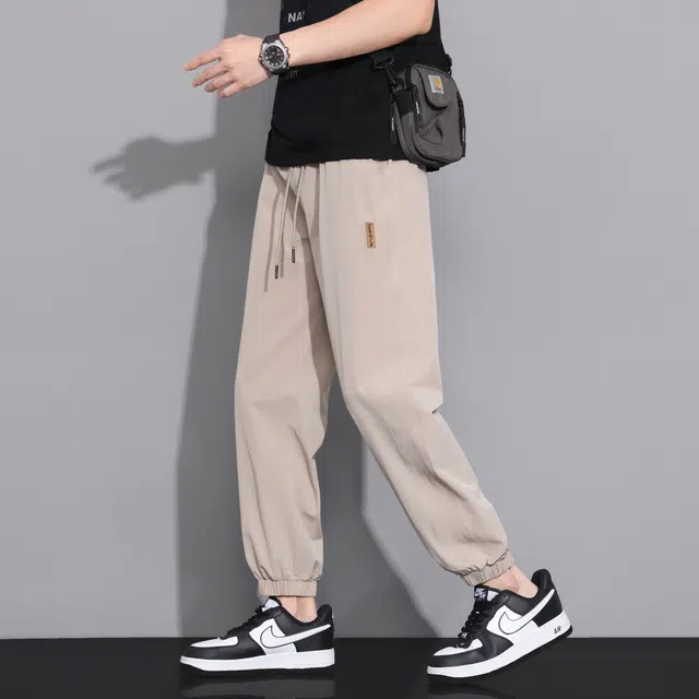 冰丝材质薄款速干弹力抗皱寻星记 复古高级感纯色美式宽松多款式潮流针织运动裤 男女同款