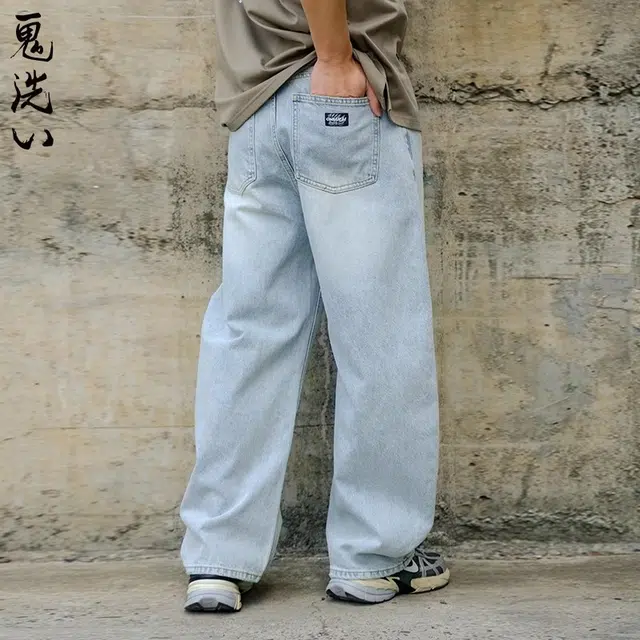 鬼洗 复古怀旧水洗皮标弯刀牛仔裤 男款