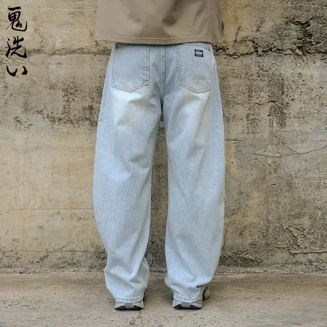 鬼洗 复古怀旧水洗皮标弯刀牛仔裤 男款