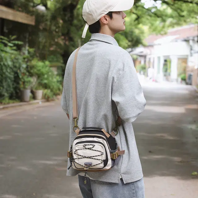 德力熊 个性撞色多功能双肩包潮牌百搭单肩包小众设计多背法手提包 尼龙 斜挎包 常规 男女同款情侣款 多色