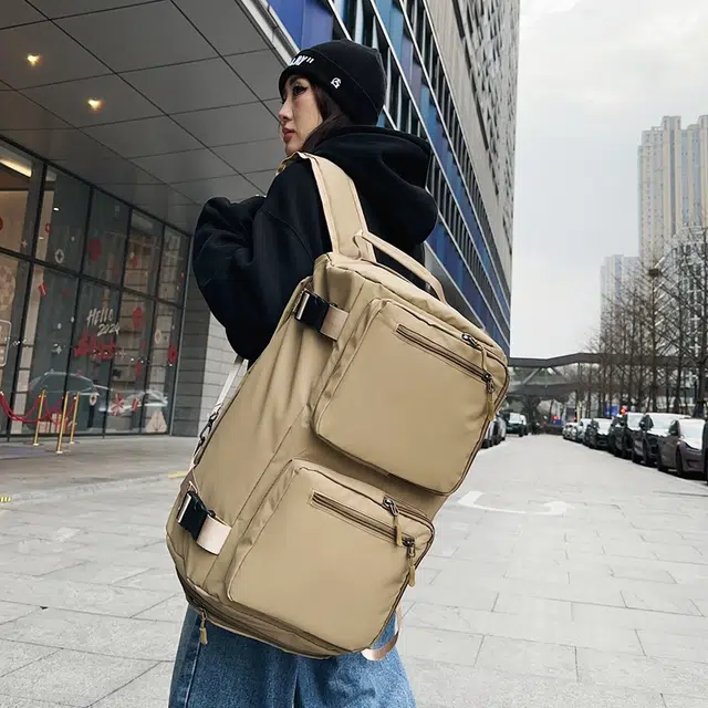 德力熊背包男女通用双色单肩包青年商务多用双肩单肩斜挎手提包休闲大容量短途旅行包牛皮多色尼龙