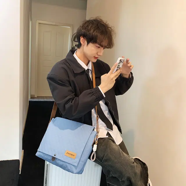 德力熊 尼龙 男女同款情侣款 潮牌新款韩系工装风背包学生休闲单肩包 多色