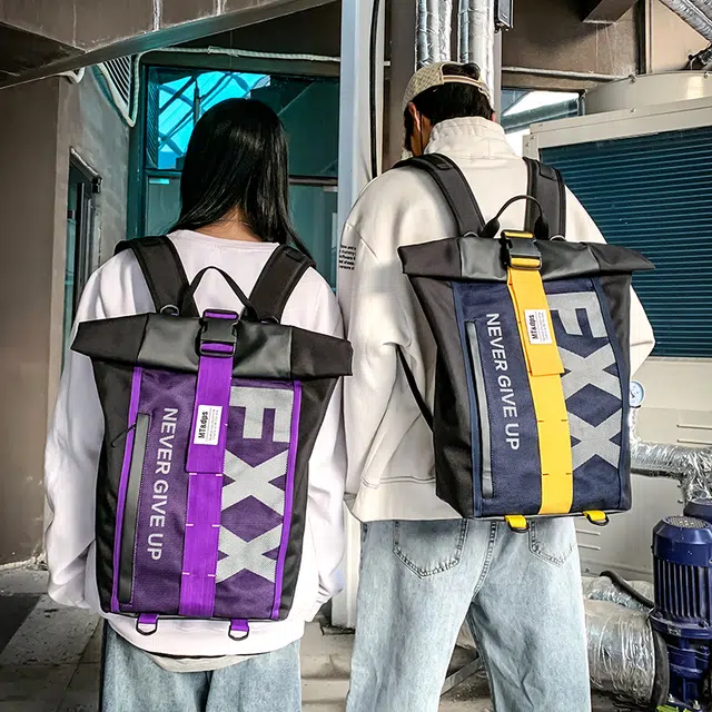 德力熊 潮牌休闲时尚大容量轻便 牛津布 书包背包双肩包 男女同款情侣款 黄色/蓝色/紫色/红色